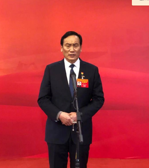 张三:群众的"两袋"装什么?