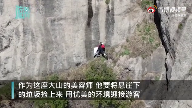 你丢的垃圾 他冒生命危险捡起