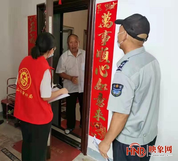 罗山县：志愿服务再敲门 筑牢疫情防控网